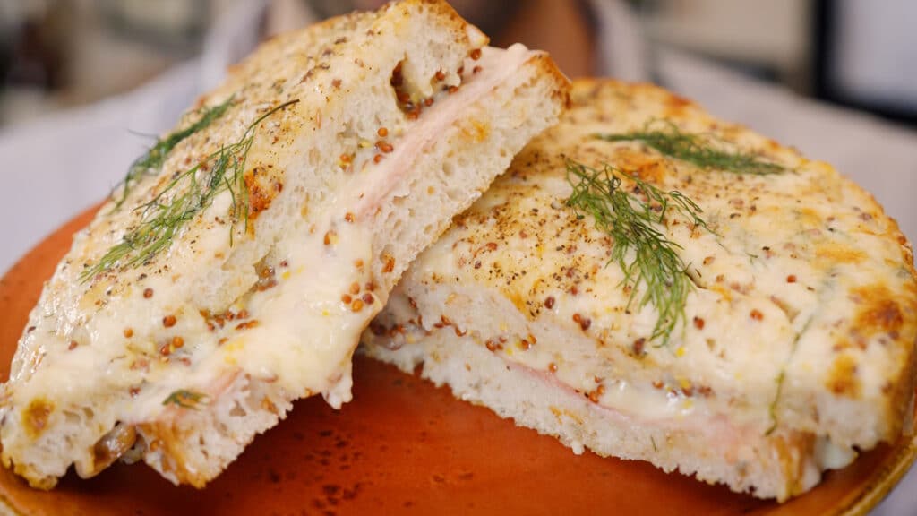 a croque monsieur sandwich on a plate