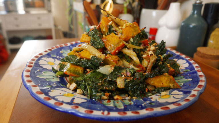 a plate of kabocha squash, fennel and kale salad